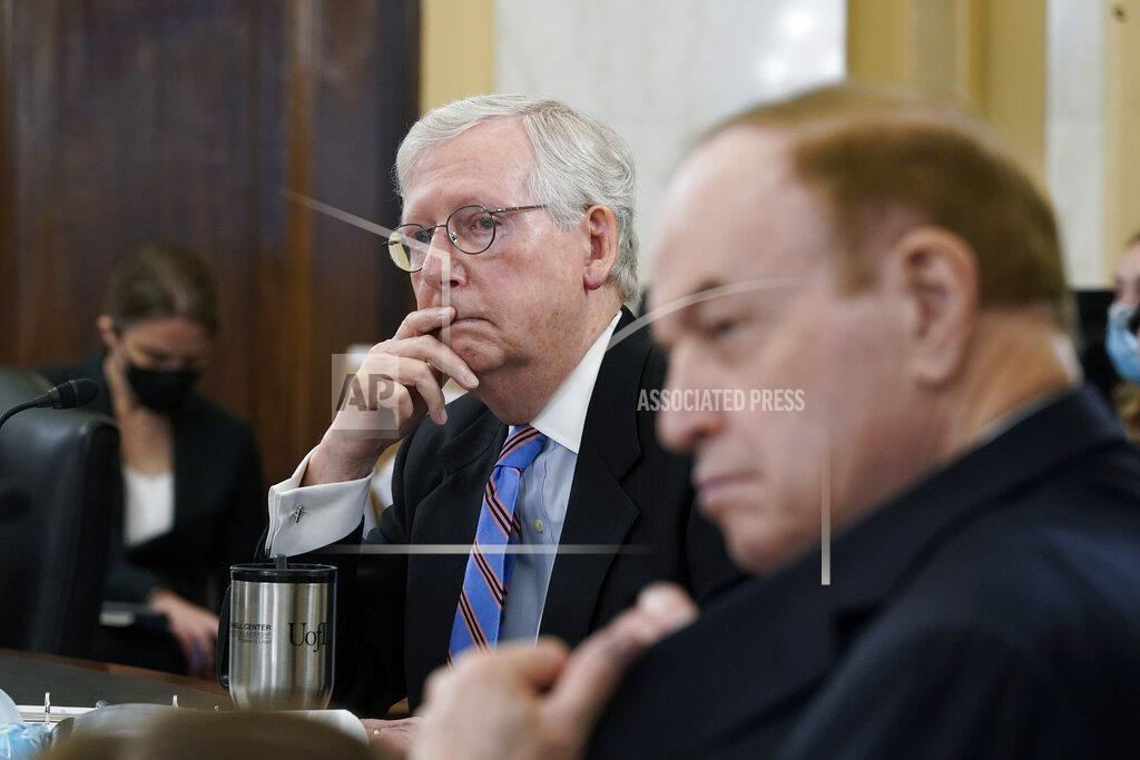 J. Scott Applewhite Senate Minority Leader Mitch McConnell, R-Ky., joined at right by Sen. Richard Shelby, R-Ala., listens during a Senate Rules Committee markup on the "For the People Act," which would expand access to voting and other voting reforms, at the Capitol in Washington, Tuesday, May 11, 2021. The bill was already passed by Democrats in the House. (AP Photo/J. Scott Applewhite)