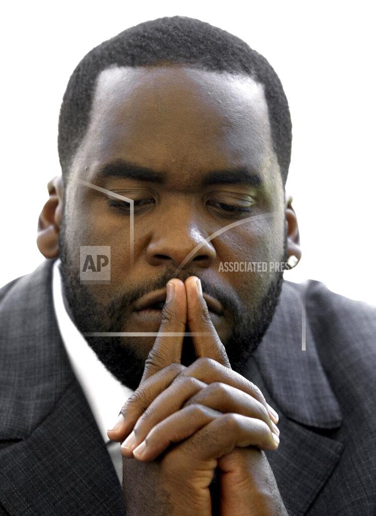 Paul Sancya FILE - In this June, 24, 2004 Detroit Mayor Kwame Kilpatrick is shown in Detroit. President Donald Trump commuted the 28-year prison sentence of the disgraced former Detroit mayor, who was convicted on federal corruption charges and served about seven years. The announcement Wednesday, Jan. 20, 2021, came in a flurry of clemency action in the final hours of Trump's White House term. (AP Photo/Paul Sancya, File)