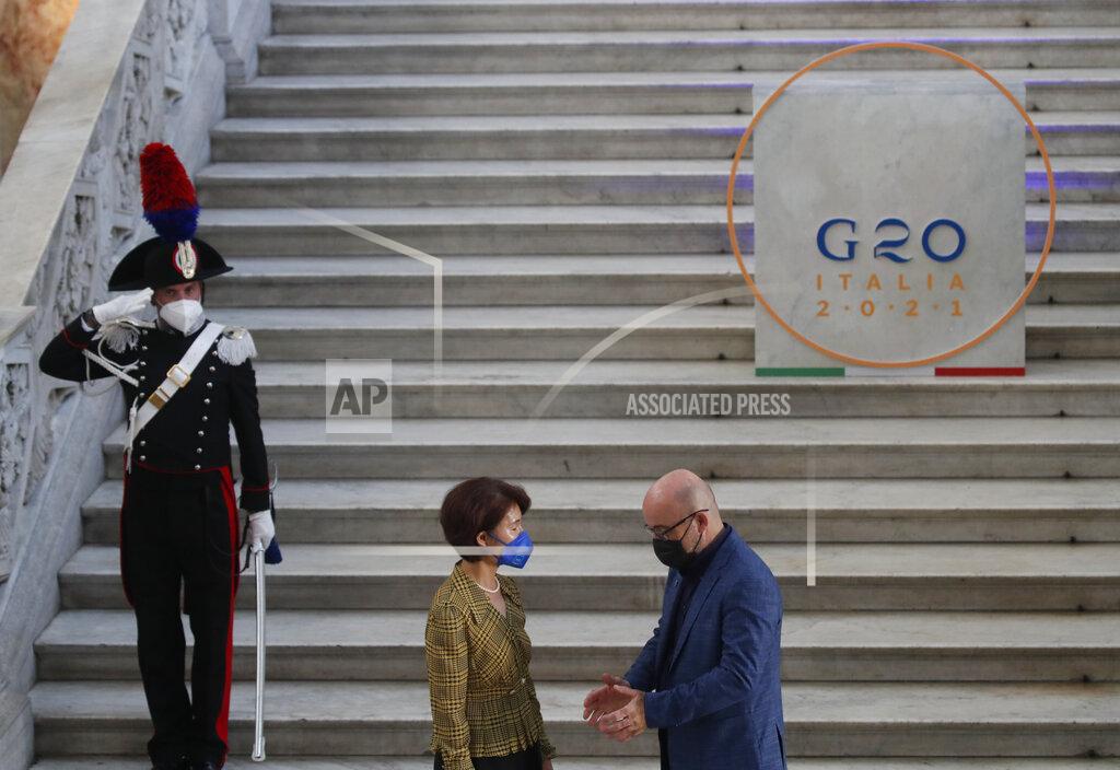 Salvatore Laporta South Korea minister of environment, Han Jeoung-ae is welcomed by Italian Minister for Ecological Transition Roberto Cingolani as she arrives at Palazzo Reale in Naples, Italy, Thursday, July 22, 2021, to take part in a G20 meeting on environment, climate and energy. (AP Photo/Salvatore Laporta)