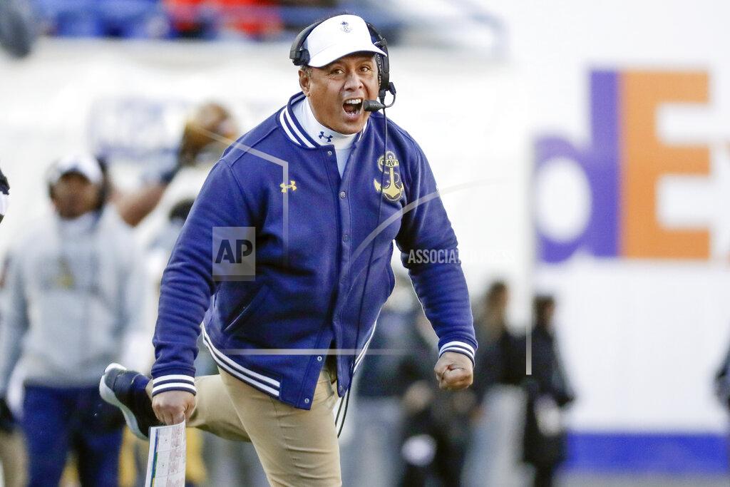 Mark Humphrey FILE - Navy head coach Ken Niumatalolo cheers his team on in the first half of the Liberty Bowl NCAA college football game against Kansas State Tuesday, Dec. 31, 2019, in Memphis, Tenn. With coach Ken Niumatalolo struggling to prepare his offense in the middle of a pandemic, Navy will be sporting a new look when it opens against Brigham Young on Sept. 7. (AP Photo/Mark Humphrey, File)