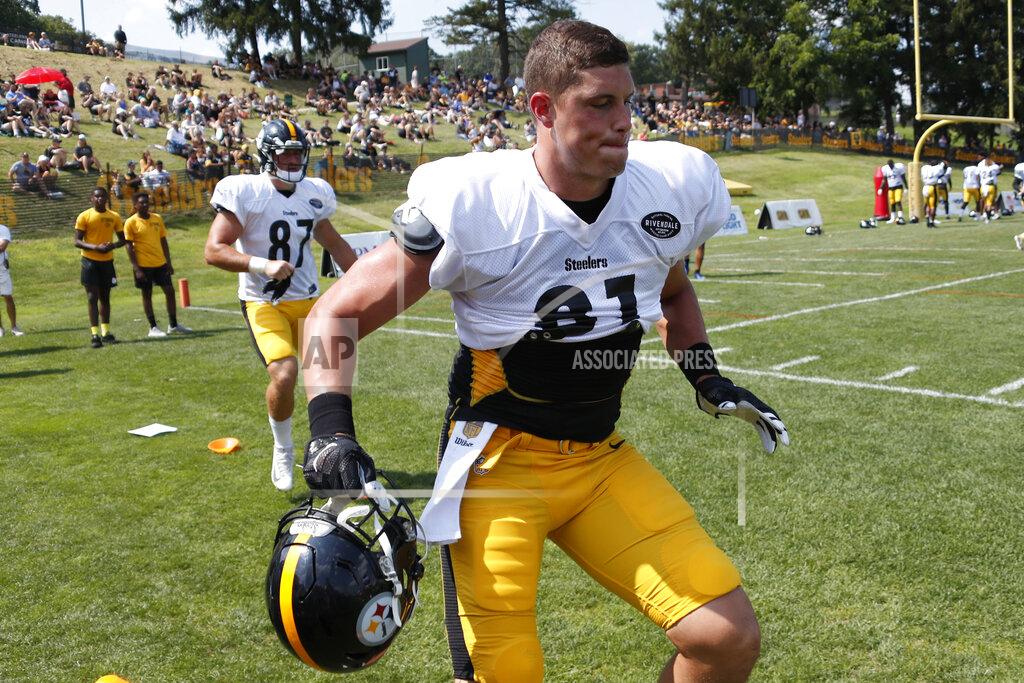 Keith Srakocic FILE - This Aug. 1, 2019, file photo shows Pittsburgh Steelers tight end Zach Gentry (81) as he performs an agility drill during practice at their NFL football training camp in Latrobe, Pa. Gentry figured he'd be an NFL quarterback, not a tight end. Justin Layne began his college career as a wide receiver, not a cornerback. Sutton Smith is learning how to play linebacker and fullback. All three offer proof of Pittsburgh's emphasis in finding adaptable young players who can do a little bit of everything. (AP Photo/Keith Srakocic, File)