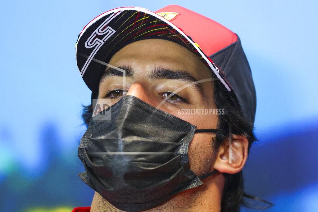 Asanka Brendon Ratnayake Ferrari driver Carlos Sainz of Spain reacts during the driver's press conference ahead of the Australian Formula One Grand Prix in Melbourne, Australia, Friday, April 8, 2022. (AP Photo/Asanka Brendon Ratnayake)