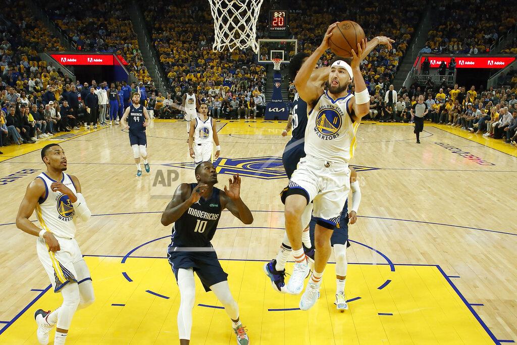Jed Jacobsohn Golden State Warriors guard Klay Thompson (11) shoots against the Dallas Mavericks during the first half of Game 2 of the NBA basketball playoffs Western Conference finals in San Francisco, Friday, May 20, 2022. (AP Photo/Jed Jacobsohn)