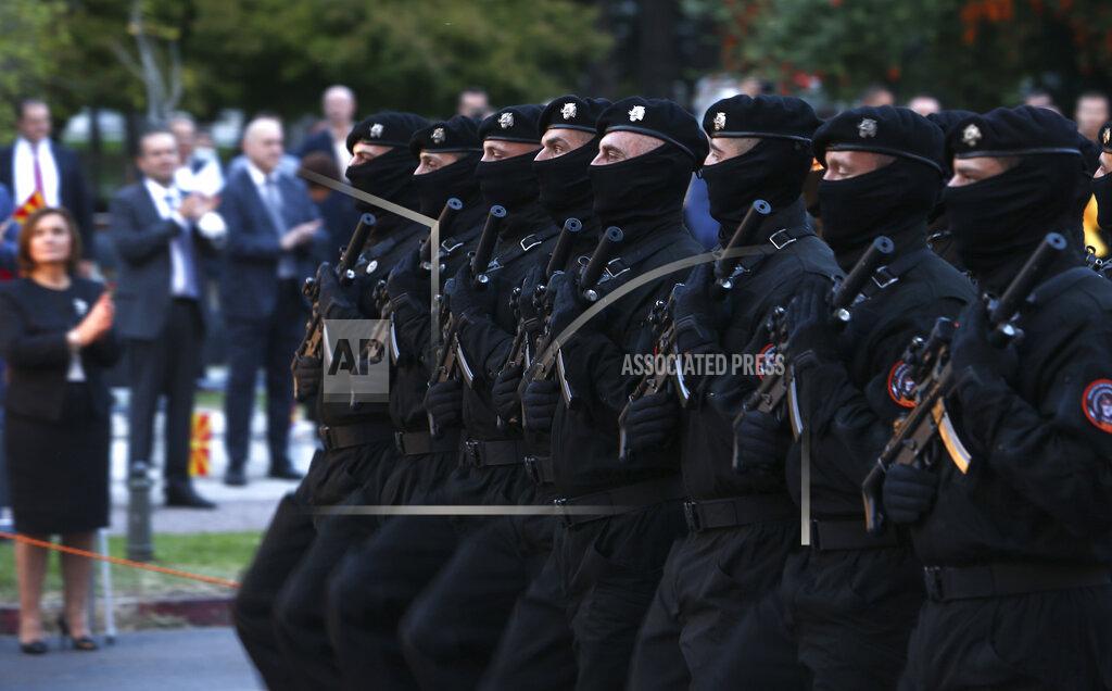 Boris Grdanoski Special police unit march during a parade to mark the Independence Day in downtown Skopje, North Macedonia, Wednesday, Sept. 8, 2021. North Macedonia is celebrating Wednesday the 30th anniversary since its independence from former Yugoslavia. (AP Photo/Boris Grdanoski)