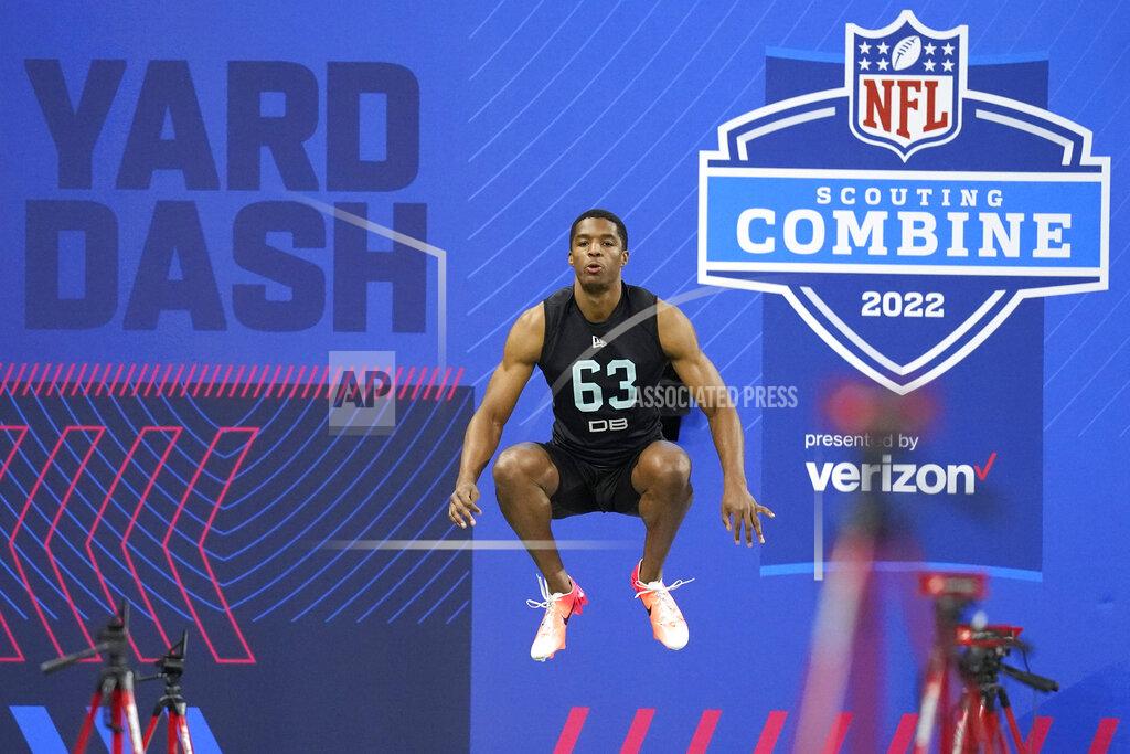 Charlie Neibergall FILE - Baylor defensive back JT Woods prepares to run the 40-yard dash at the NFL football scouting combine, Sunday, March 6, 2022, in Indianapolis. Indianapolis will be keeping the NFL scouting combine for the next two years. At the owners meetings in Atlanta on Tuesday, May 24, 2022, the city that has staged the winter event since 1987 for players entering the draft was granted hosting rights for 2023 and 2024. This was the first time the NFL put the combine up for bidding, with Dallas and Los Angeles also seeking to hold the combine. (AP Photo/Charlie Neibergall, File)