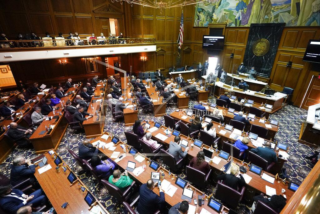 The House of Representative meet in the chamber at the Statehouse, Thursday, April 22, 2021, in Indianapolis. (AP Photo/Darron Cummings)