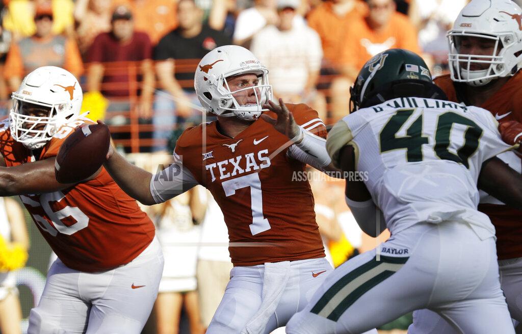 Eric Gay FILE - In this Saturday, Oct. 13, 2018, file photo, Texas quarterback Shane Buechele (7) throws against Baylor during the second half of an NCAA college football game, in Austin, Texas. Experienced backup Buechele entered the NCAA transfer database Thursday, Jan. 17, 2019, and could be playing somewhere else next season. (AP Photo/Eric Gay, File)
