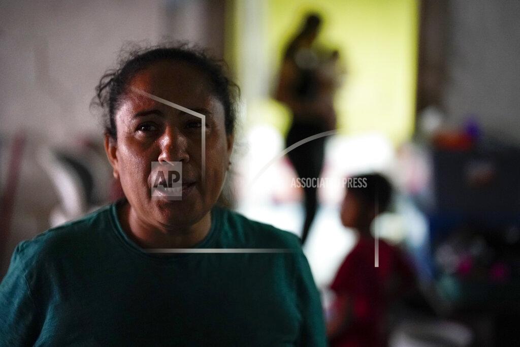Gregory Bull FILE - Iracema Figueroa, left, of Honduras, looks on at a shelter for migrants, May 20, 2022, in Tijuana, Mexico. The Supreme Court has ruled that the Biden administration properly ended a Trump-era policy forcing some U.S. asylum-seekers to wait in Mexico. The justices’ 5-4 decision for the administration came in a case about the “Remain in Mexico” policy under President Donald Trump. (AP Photo/Gregory Bull, File)