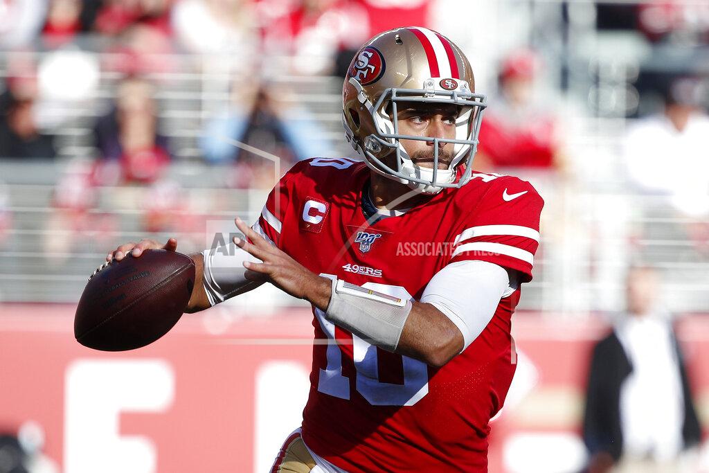 San Francisco 49ers quarterback Jimmy Garoppolo (10) looks to pass against the Atlanta Falcons during the first half of an NFL football game in Santa Clara, Calif., Sunday, Dec. 15, 2019. (AP Photo/Josie Lepe)