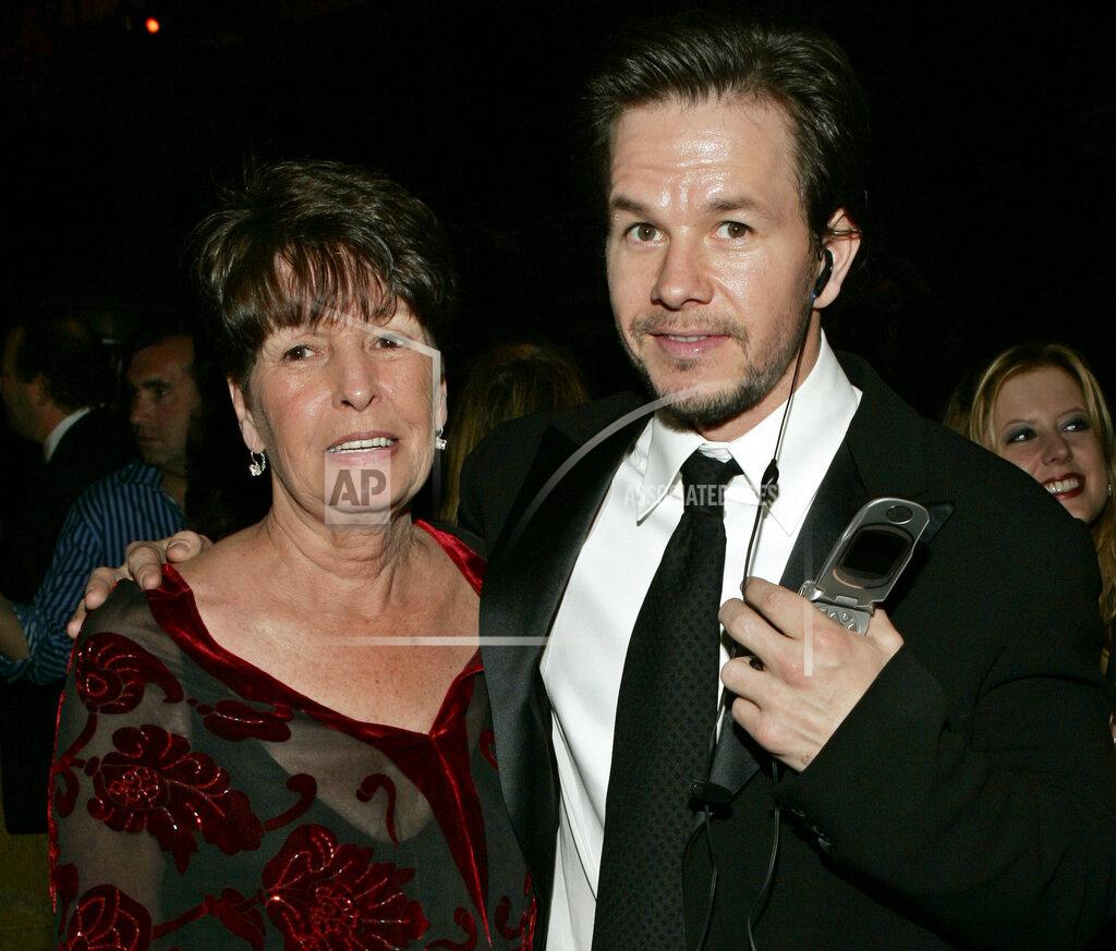 Lisa Rose FILE - In this Sunday, Jan. 16, 2005, file photo, Mark Wahlberg, executive producer of the HBO series "Entourage," and his mother Alma pose at the HBO party after the 62nd Annual Golden Globe Awards, in Beverly Hills, Calif. Alma Wahlberg, the mother of entertainers Mark and Donnie Wahlberg and a regular on their reality series "Wahlburgers", has died, her sons said on social media Sunday, April 18, 2021. She was 78. "My angel. Rest in peace," Mark Wahlberg tweeted. (AP Photo/Lisa Rose, File)