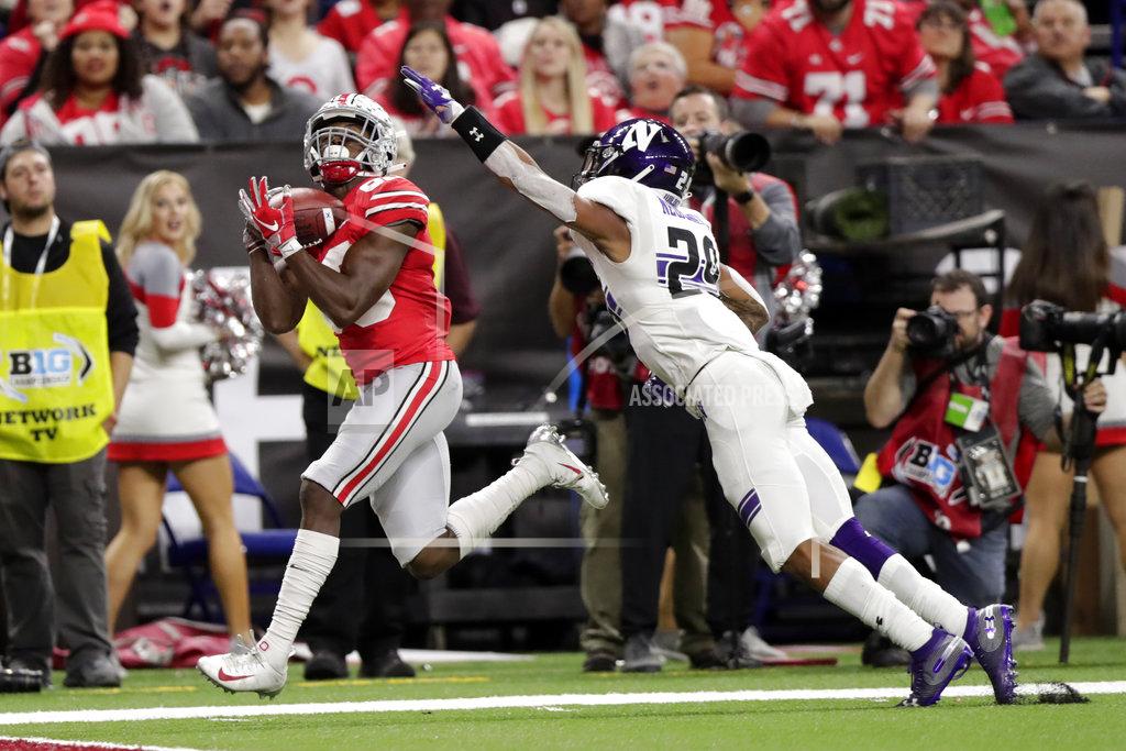 Michael Conroy Ohio State wide receiver Terry McLaurin, left, makes a touchdown reception against Northwestern defensive back Greg Newsome II during the first half of the Big Ten championship NCAA college football game, Saturday, Dec. 1, 2018, in Indianapolis. (AP Photo/Michael Conroy)