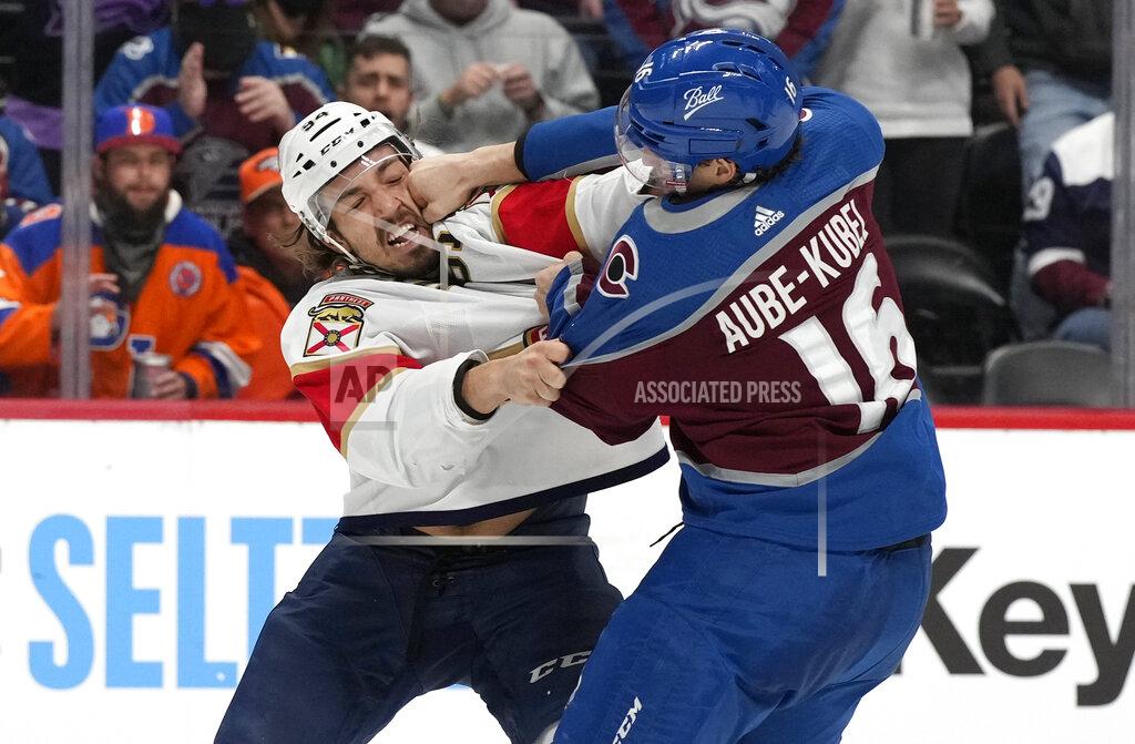 David Zalubowski Florida Panthers left wing Ryan Lomberg, left, fights with Colorado Avalanche right wing Nicolas Aube-Kubel in the second period of an NHL hockey game Sunday, Dec. 12, 2021, in Denver. (AP Photo/David Zalubowski)