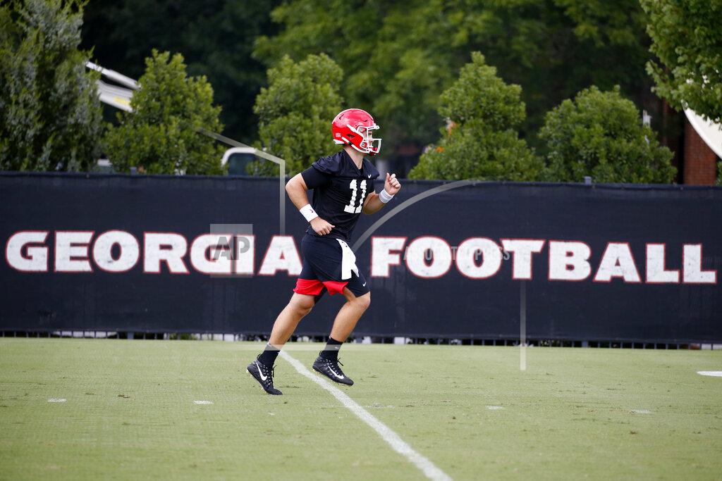 John Bazemore Georgia quarterback Jake Fromm (11) runs during the team's first scheduled NCAA college football practice Friday, Aug. 2, 2019, in Athens, Ga. (AP Photo/John Bazemore)