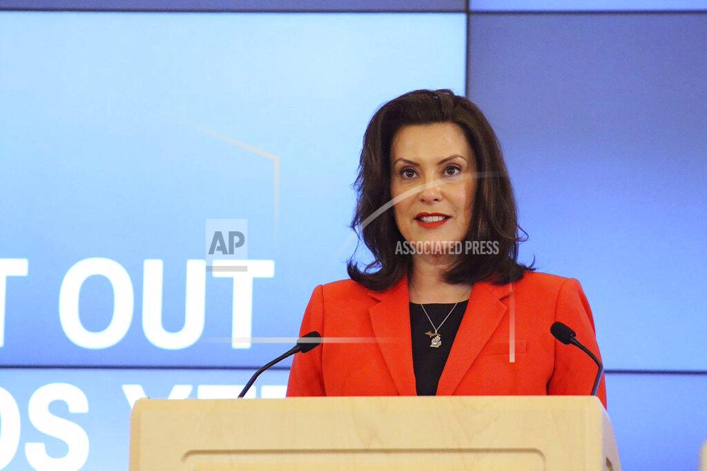 In a photo provided by the governor's office, Michigan Gov. Gretchen Whitmer speaks in Lansing, Mich., Monday, May 4, 2020. Whitmer's administration says hospitals and physicians have "broad discretion" to decide whether to delay nonessential procedures during the pandemic. In-person contact should be limited as much as possible. But if physicians determine it is necessary, they should take steps such as asking patients to wait in their car until their appointment and requiring masks. (Michigan Office of the Governor via AP, Pool)