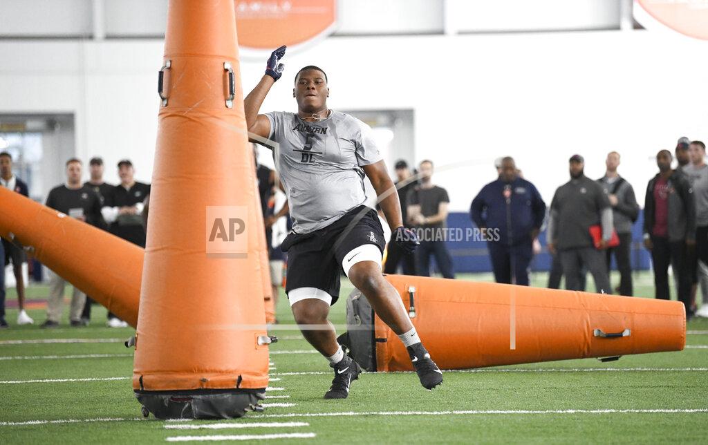 Julie Bennett Defensive tackle Derrick Brown works out during Auburn NCAA college football Pro Day Friday, March 6, 2020, in Auburn, Ala. (AP Photo/Julie Bennett)