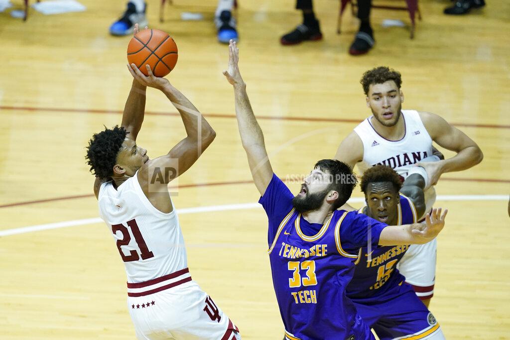 Darron Cummings Indiana's Jerome Hunter (21) shoots over Tennessee Tech's Shandon Goldman (33) during the second half of an NCAA college basketball game, Wednesday, Nov. 25, 2020, in Bloomington, Ind. (AP Photo/Darron Cummings)