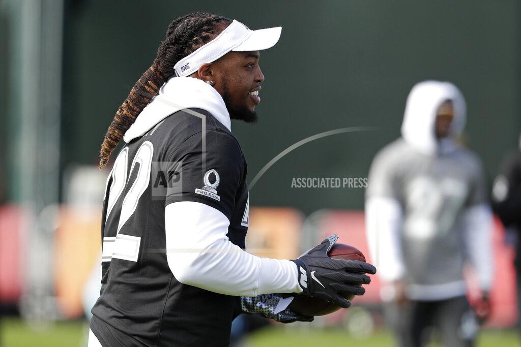 John Raoux AFC running back Derrick Henry of the Tennessee Titans walks back to the huddle after a play during a practice for the NFL Pro Bowl football game Wednesday, Jan. 22, 2020, in Kissimmee, Fla. (AP Photo/John Raoux)