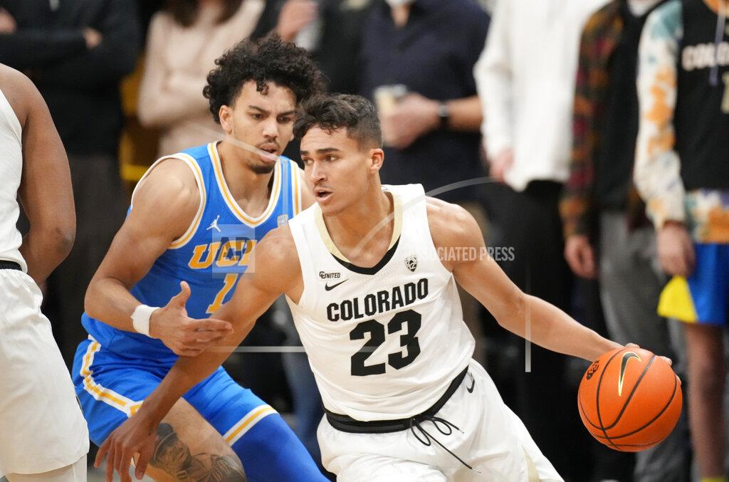 David Zalubowski Colorado forward Tristan da Silva, front, is defended by UCLA guard Jules Bernard during the first half of an NCAA college basketball game Saturday, Jan. 22, 2022, in Boulder, Colo. (AP Photo/David Zalubowski)