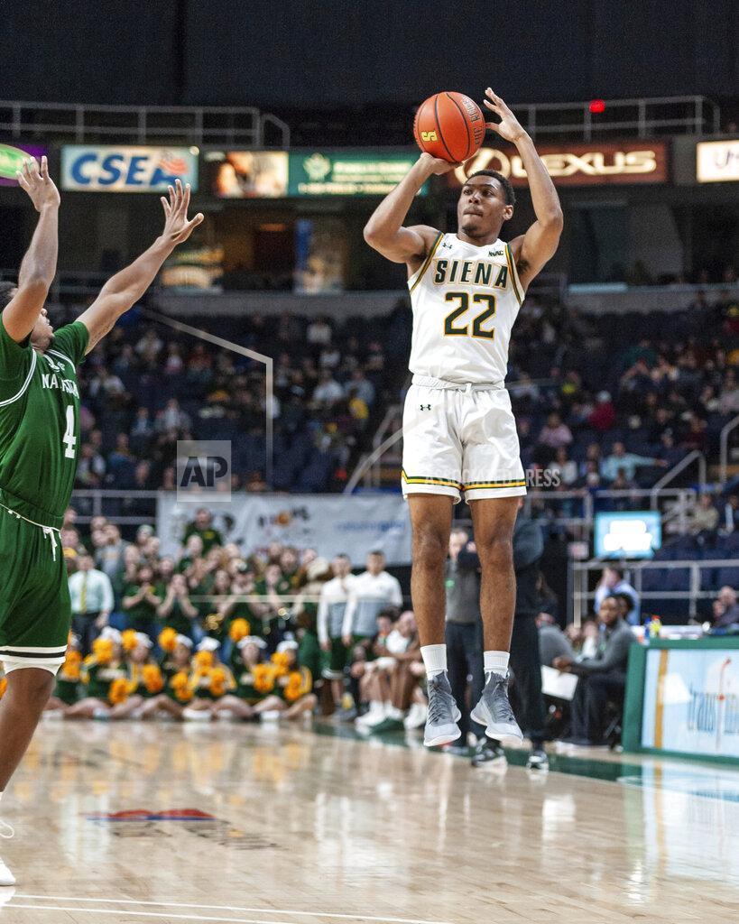 Rob Simmons In this Jan. 27, 2019 photo provided by Siena College, Siena point guard Jalen Pickett shoots from the floor against a Manhattan College defender during their game at Siena College in Loudonville, N.Y. Pickett, who averages 15.5 points and leads the MAAC with 6.4 assists per game, has helped lead Siena into contention for the Metro Atlantic Athletic Conference regular-season title. (Rob Simmons/Siena College via AP)