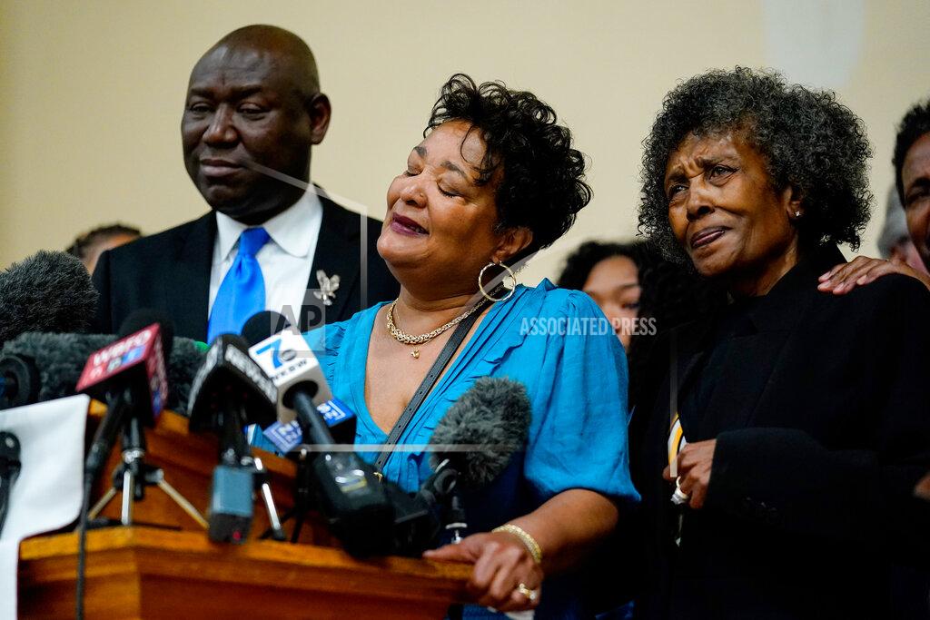 Matt Rourke The daughters of Ruth Whitfield, a victim of shooting at a supermarket, Angela Crawley, center, and Robin Harris, accompanied by attorney Benjamin Crump, speak with members of the media during a news conference in Buffalo, N.Y., Monday, May 16, 2022. (AP Photo/Matt Rourke)
