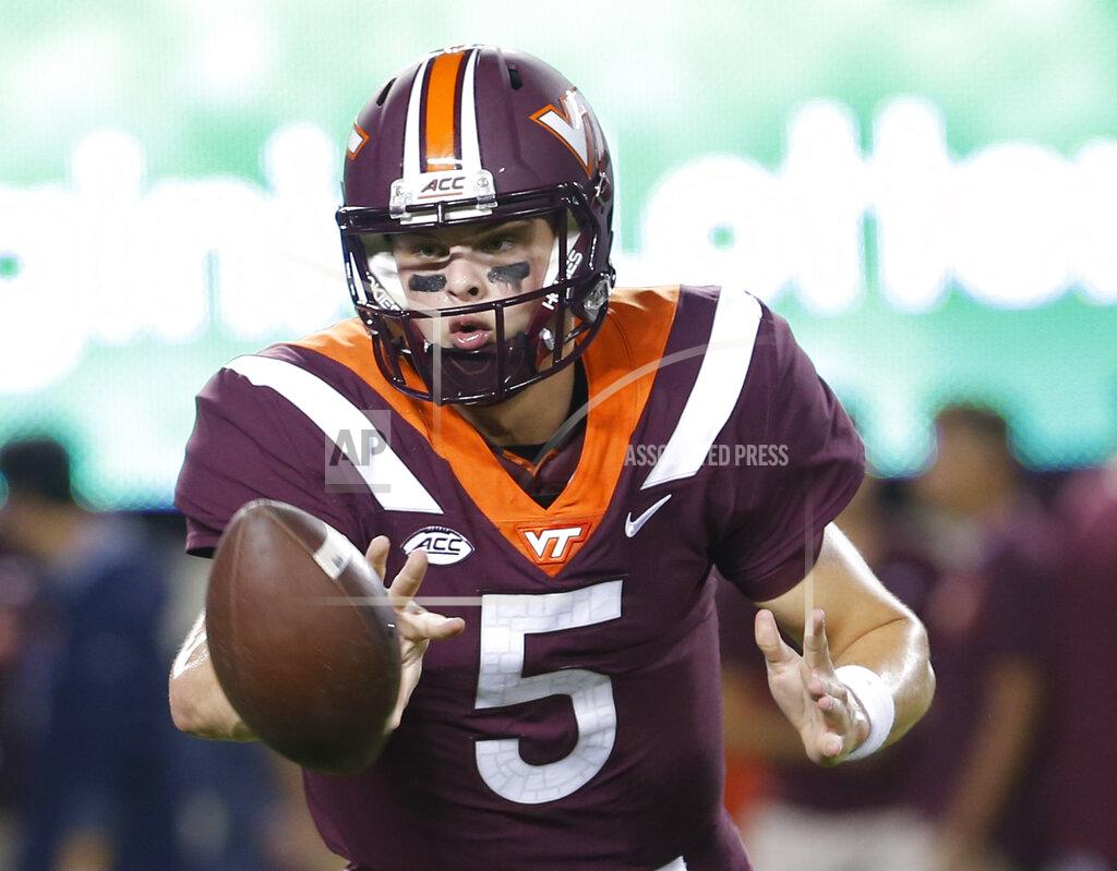 Steve Helber FILE - In this Oct. 6. 2018, file photo, Virginia Tech quarterback Ryan Willis (5) warms up prior to the start of an NCAA college football game in Blacksburg, Va. (AP Photo/Steve Helber, File)