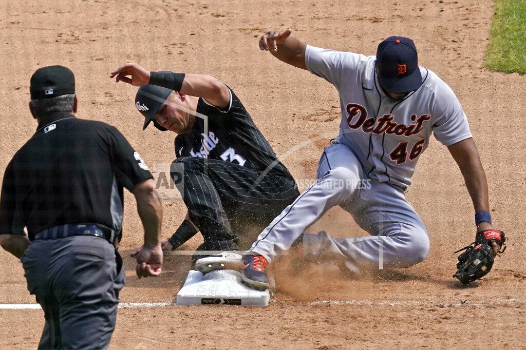 Nam Y. Huh Detroit Tigers third baseman Jeimer Candelario, right, forces out Chicago White Sox's Jake Lamb at third during the sixth inning of a baseball game in Chicago, Saturday, June 5, 2021. (AP Photo/Nam Y. Huh)