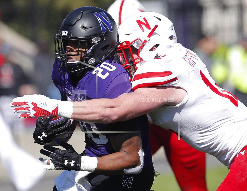 Jim Young Northwestern's John Moten IV, left, is tackled by Nebraska's Luke Gifford during the first half of an NCAA college football game Saturday, Oct. 13, 2018, in Evanston, Ill.. (AP Photo/Jim Young)