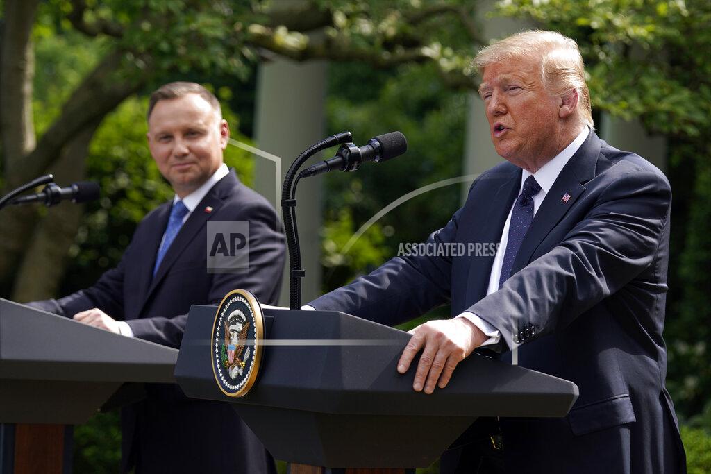 Evan Vucci President Donald Trump speaks during a news conference with Polish President Andrzej Duda in the Rose Garden of the White House, Wednesday, June 24, 2020, in Washington. (AP Photo/Evan Vucci)