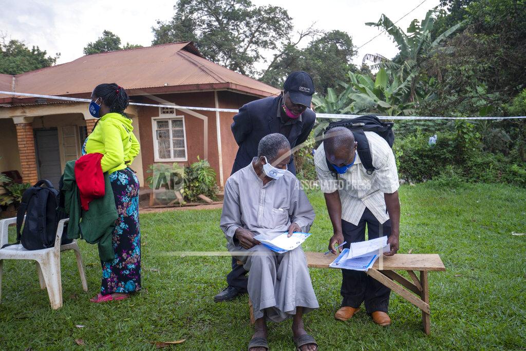 Jerome Delay Election officials prepare a polling station in Kampala, Uganda, Thursday, Jan. 14, 2021. Ugandans are voting in a presidential election tainted by widespread violence that some fear could escalate as security forces try to stop supporters of leading opposition challenger BobiWine from monitoring polling stations.(AP Photo/Jerome Delay)