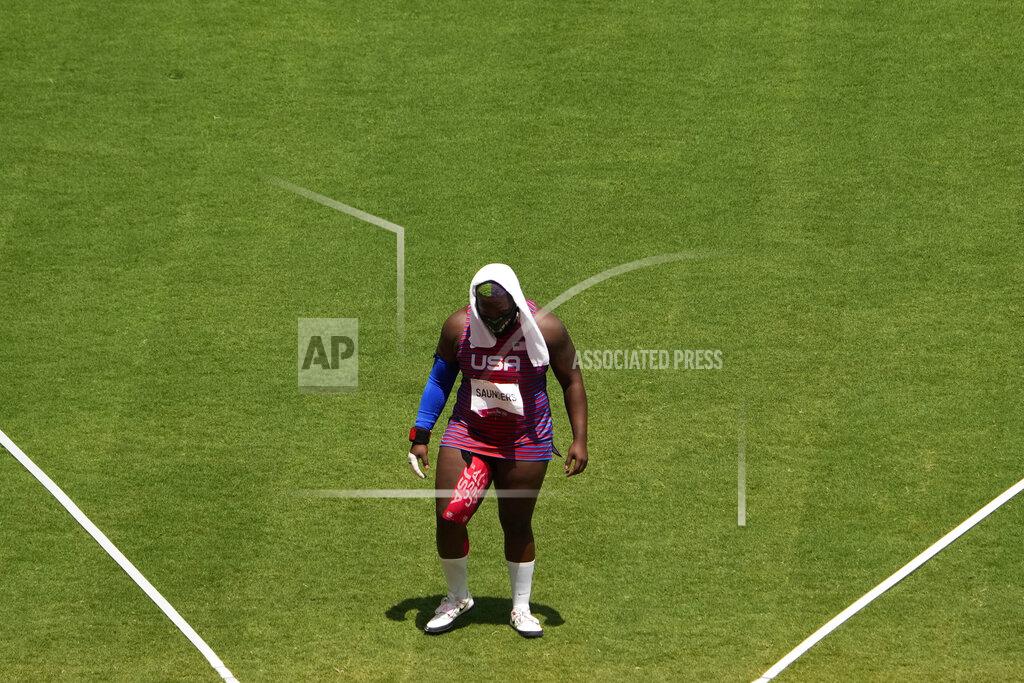 Raven Saunders, of United States, cools off during the woman's shot put final at the 2020 Summer Olympics, Sunday, Aug. 1, 2021, in Tokyo. (AP Photo/Charlie Riedel)