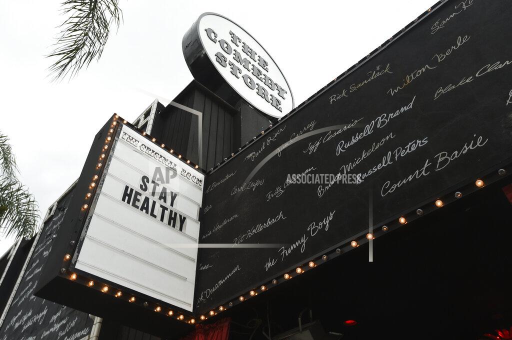 Chris Pizzello FILE - The marquee for The Comedy Store nightclub reads "Stay Healthy", on March 16, 2020, in West Hollywood, Calif. Los Angeles Mayor Eric Garcetti ordered all of the city's bars, nightclubs, restaurants, gyms and entertainment venues to close in order to prevent the spread of the coronavirus. (AP Photo/Chris Pizzello, File)