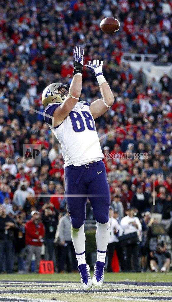Jae C. Hong Washington tight end Drew Sample catches a pass in the end zone against Ohio State during the second half of the Rose Bowl NCAA college football game Tuesday, Jan. 1, 2019, in Pasadena, Calif. (AP Photo/Jae C. Hong)