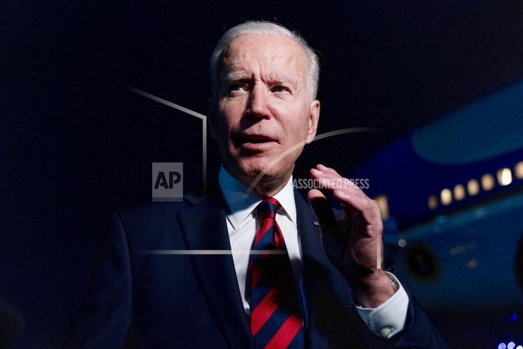 Andrew Harnik President Joe Biden talks to reporters before he boards Air Force One at Cincinnati/Northern Kentucky International Airport in Hebron, Ky., Wednesday, July 21, 2021, to travel back to Washington after speaking at a CNN town hall in Cincinnati. (AP Photo/Andrew Harnik)