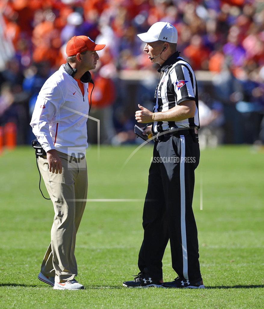Richard Shiro Clemson head coach Dabo Swinney talks with an official during the first half of an NCAA college football game against Louisville, Saturday, Nov. 3, 2018, in Clemson, S.C. (AP Photo/Richard Shiro)
