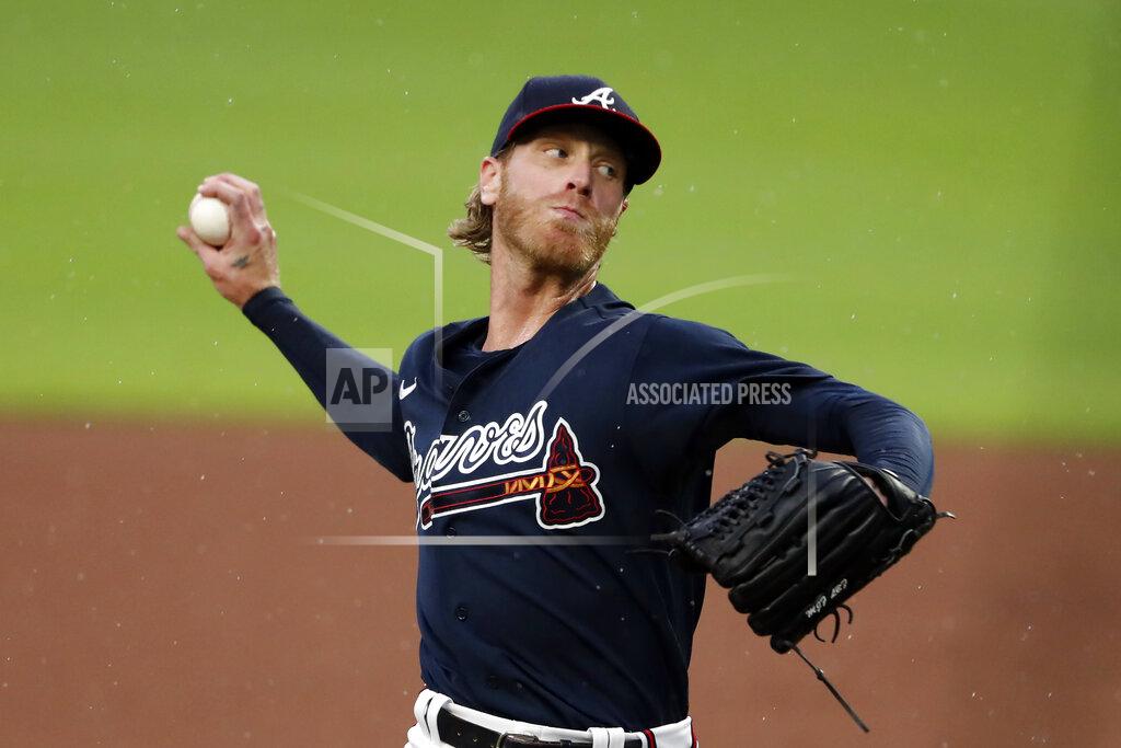 John Bazemore Atlanta Braves starting pitcher Mike Foltynewicz (26) works against the Miami Marlins during the first inning if an exhibition baseball game Tuesday, July 21, 2020, in Atlanta. (AP Photo/John Bazemore)