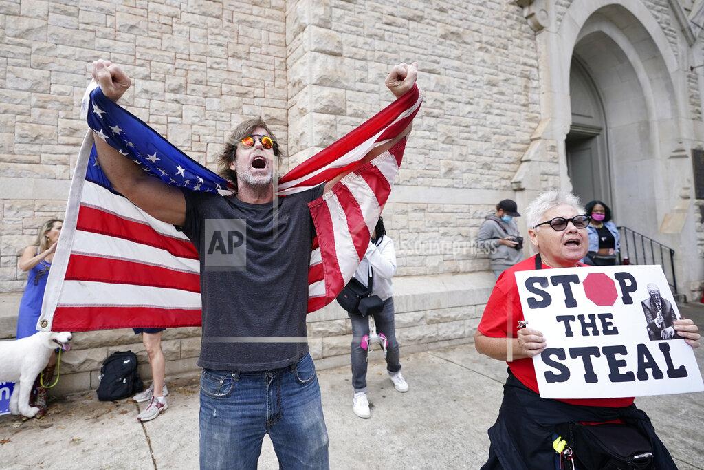 John Bazemore Supporters of President Donald Trump protest near the state capitol, Saturday, Nov. 7, 2020 in Atlanta. Democrat Joe Biden defeated President Donald Trump to become the 46th president of the United States positioning himself to lead a nation gripped by the historic pandemic and a confluence of economic and social turmoil. (AP Photo/John Bazemore)