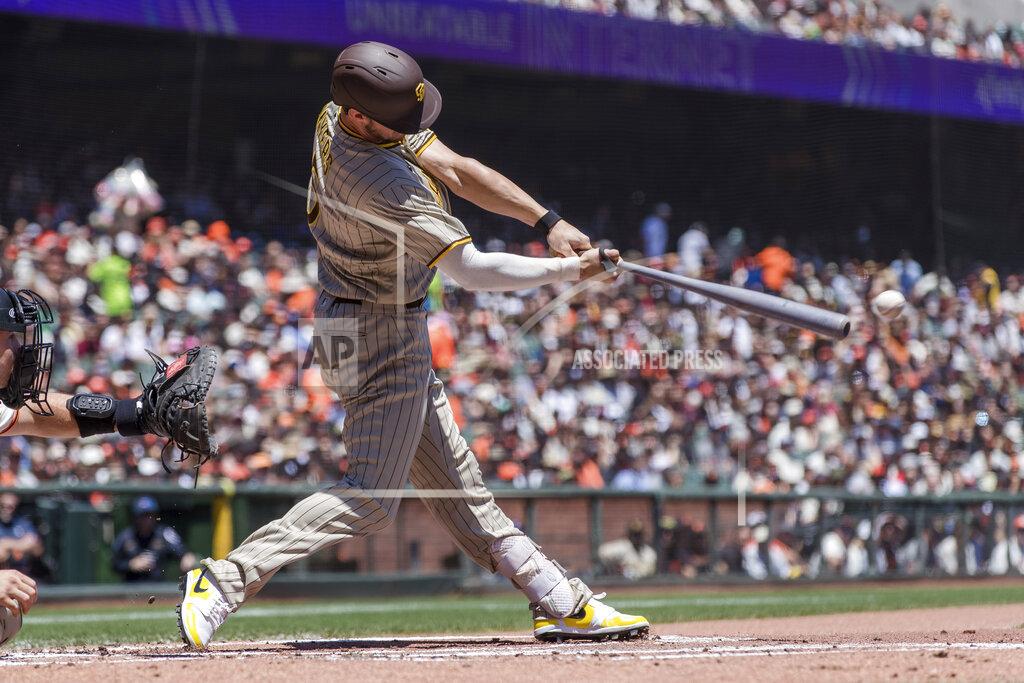 John Hefti San Diego Padres' Wil Myers hits an RBI single against the San Francisco Giants during the first inning of a baseball game in San Francisco, Sunday, May 22, 2022. (AP Photo/John Hefti)
