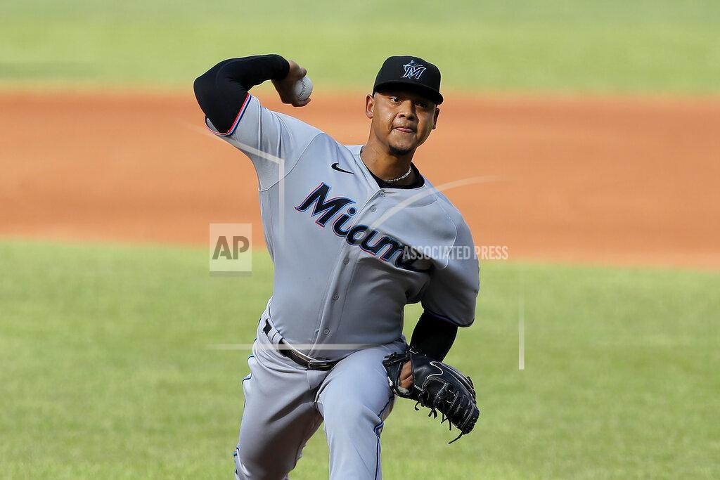 Julio Cortez Miami Marlins starting pitcher Elieser Hernandez throws a pitch to the Baltimore Orioles during the first inning in game one of a baseball double-header, Wednesday, Aug. 5, 2020, in Baltimore. (AP Photo/Julio Cortez)