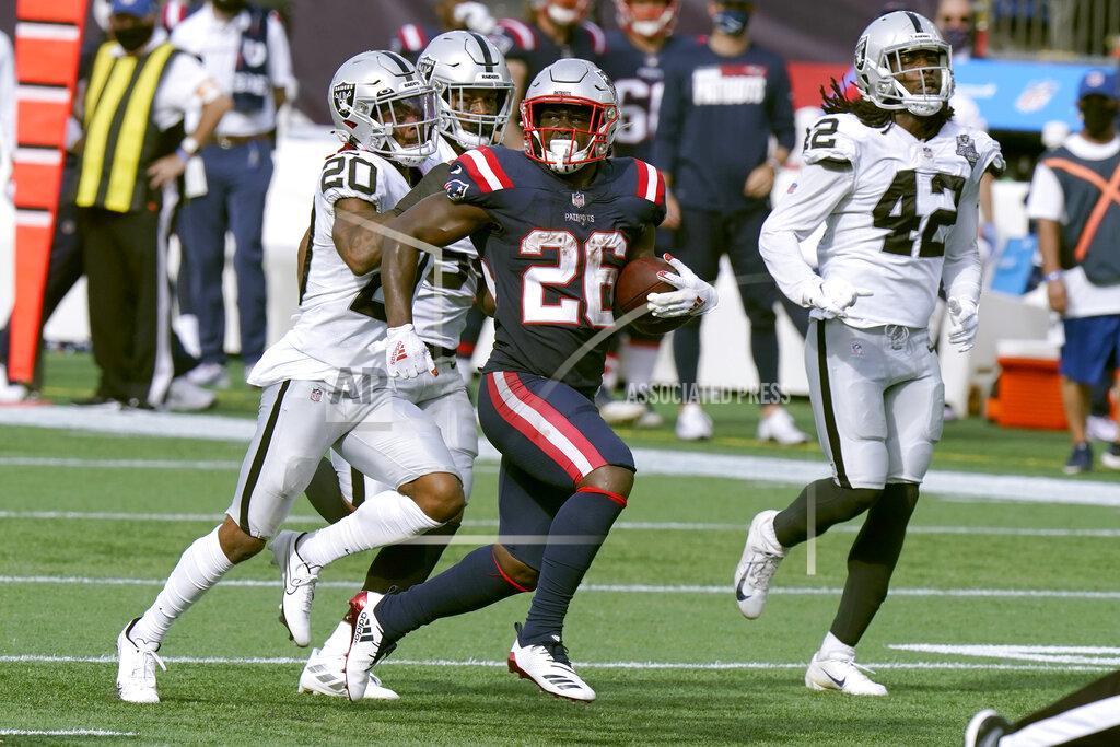 Steven Senne New England Patriots running back Sony Michel (26) gains yardage against the Las Vegas Raiders in the second half of an NFL football game, Sunday, Sept. 27, 2020, in Foxborough, Mass. (AP Photo/Steven Senne)