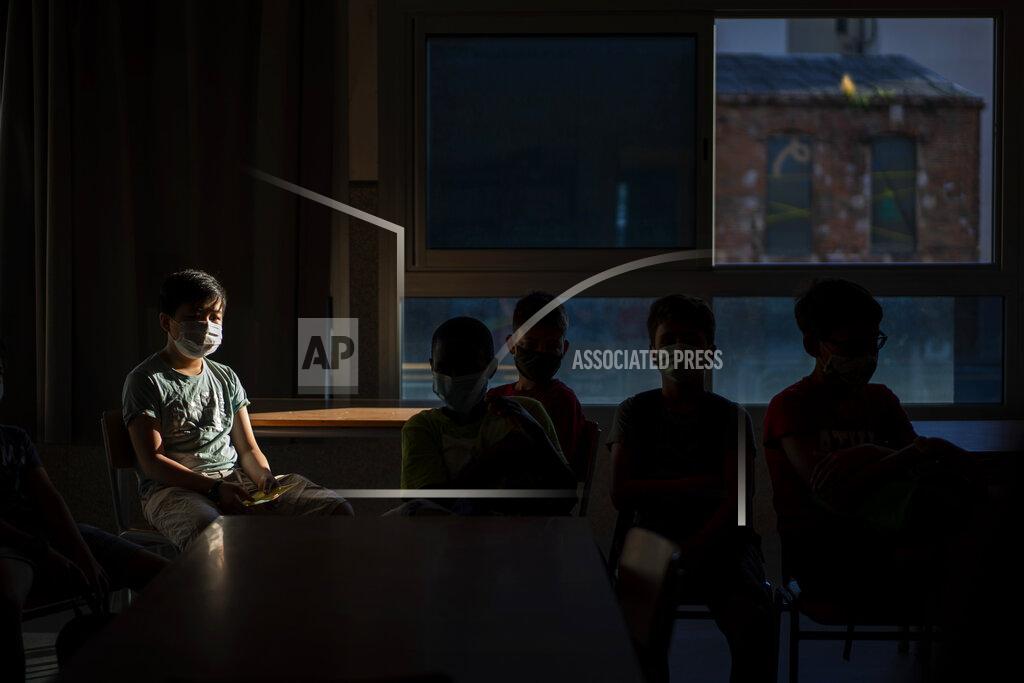 Emilio Morenatti Students wearing face masks to prevent the spread of coronavirus sit in their classroom in a school in Barcelona, Spain, Monday, Sept. 14, 2020. (AP Photo/Emilio Morenatti)