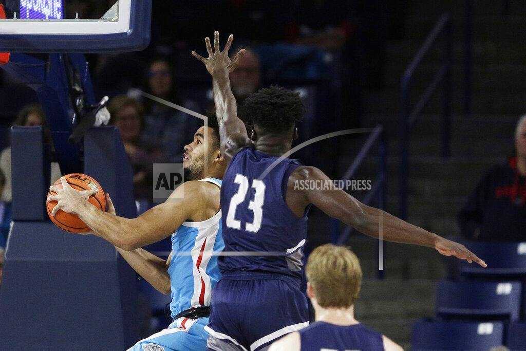 Young Kwak Gonzaga forward Colby Brooks, left, shoots while defended by North Florida guard Jah Nze during the second half of an NCAA college basketball game, Monday, Nov. 7, 2022, in Spokane, Wash. Gonzaga won 104-63. (AP Photo/Young Kwak)