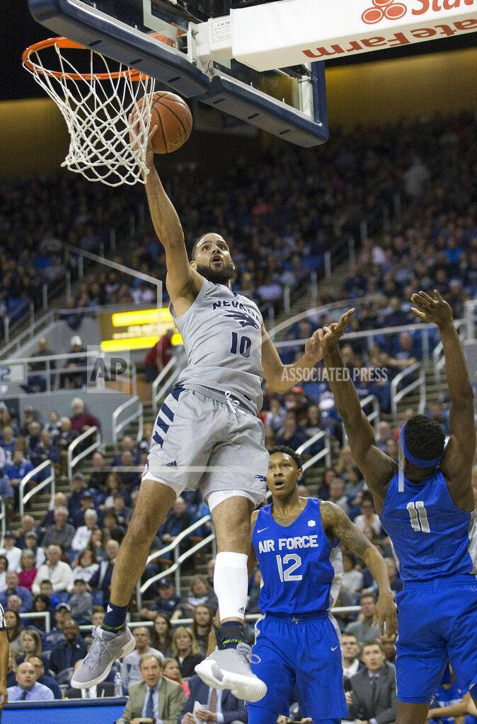 Tom R. Smedes Nevada forward Caleb Martin (10) lays the ball up during the first half against Air Force in an NCAA college basketball game in Reno, Nev., Saturday, Jan. 19, 2019. (AP Photo/Tom R. Smedes)