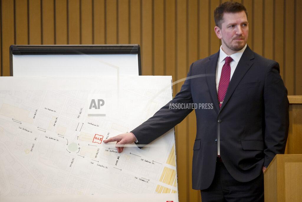Dave Killen FILE - Prosecutor Shawn Overstreet presents his opening statement at the murder trial of romance writer Nancy Crampton Brophy in Portland, Ore., Monday, April 4, 2022. A jury in Portland, Oregon, has convicted the self-published romance novelist — who once wrote an essay titled "How to Kill Your Husband" — of fatally shooting her husband four years ago. (Dave Killen/The Oregonian via AP, Pool)