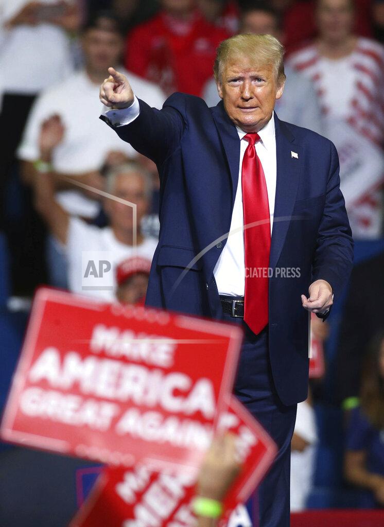 Matt Barnard President Donald Trump points during his campaign rally at the BOK Center in downtown Tulsa, Okla., Saturday, June 20, 2020. (Matt Barnard/Tulsa World via AP)