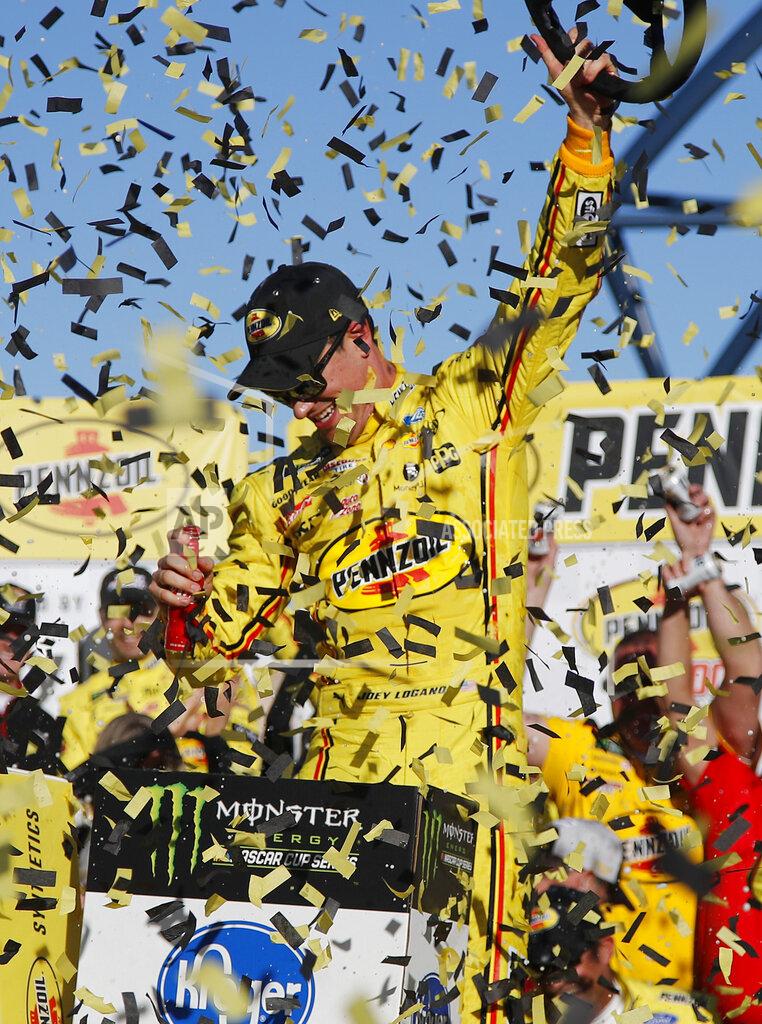 John Locher Joey Logano celebrates after winning a NASCAR Cup Series auto race at Las Vegas Motor Speedway, Sunday, March 3, 2019, in Las Vegas. (AP Photo/John Locher)