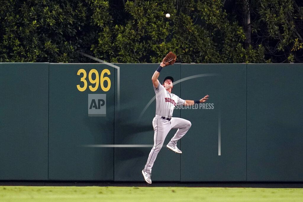 Marcio Jose Sanchez Houston Astros center fielder Jake Meyers makes a leaping catch on a pop fly by Los Angeles Angels' Kean Wong during the sixth inning of a baseball game Tuesday, Sept. 21, 2021, in Anaheim, Calif. (AP Photo/Marcio Jose Sanchez)