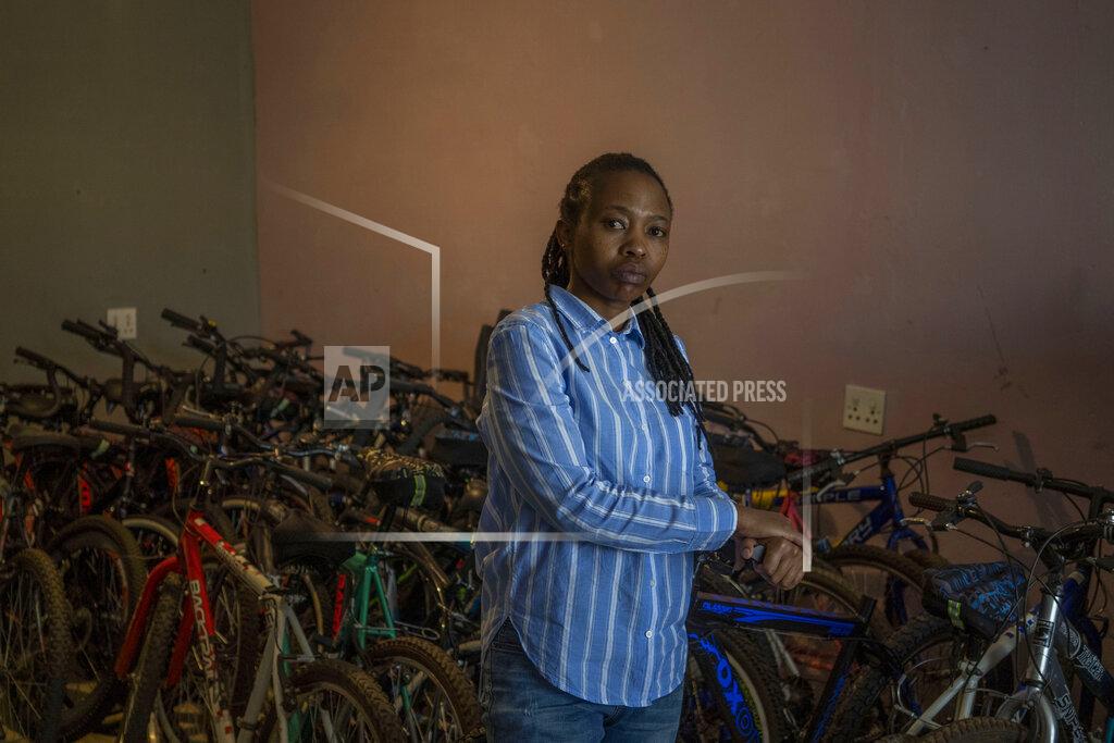 Bram Janssen In this Friday May 1, 2020 photo, 34-year-old entrepreneur Fino Dlamini poses for a photograph inside her office in the Soweto township outside Johannesburg, South Africa. Business was good in January and February, and projections for the rest of 2020 were excellent. Then the coronavirus brought everything to an abrupt halt. Dlamini was confined to her small home under a strict lockdown, with few options for earning money. South Africa is struggling to balance its fight against the coronavirus with its dire need to resume economic activity. The country with the Africa’s most developed economy also has its highest number of infections — more than 19,000. (AP Photo/Bram Janssen)
