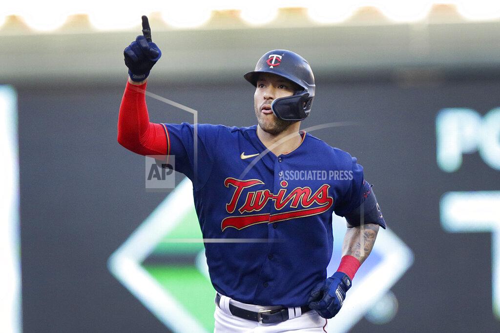 Andy Clayton-King Minnesota Twins' Carlos Correa celebrates his home run against the Cleveland Guardians during the third inning of a baseball game Wednesday, June 22, 2022, in Minneapolis. (AP Photo/Andy Clayton-King)