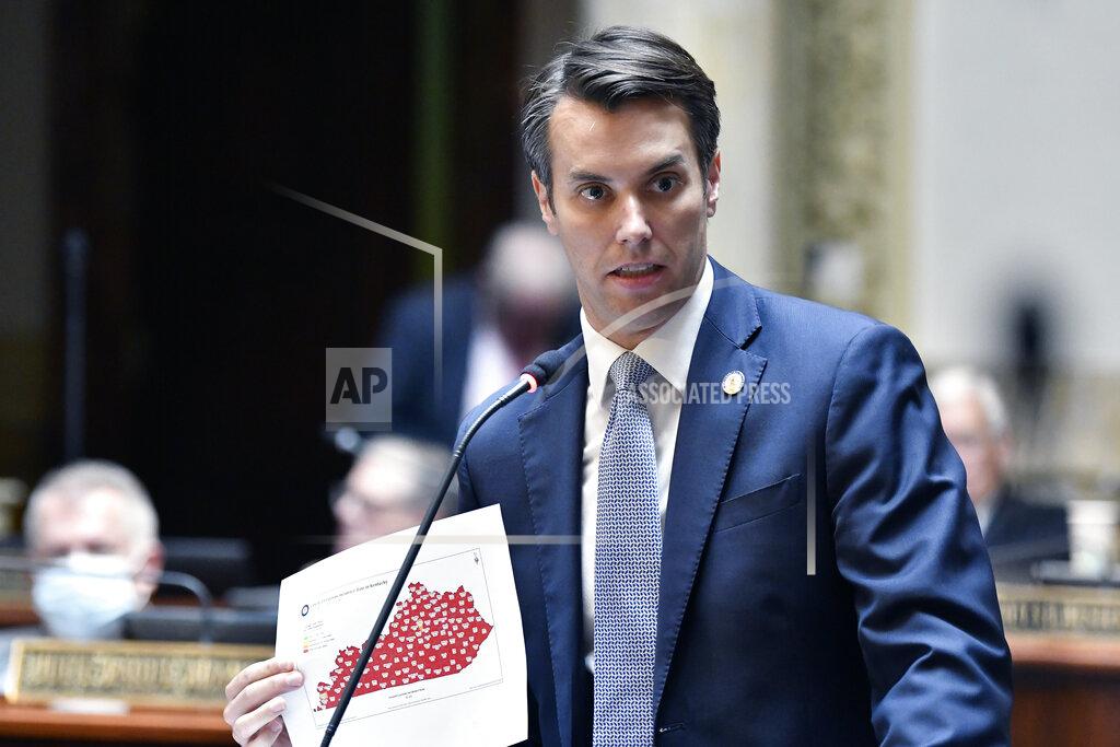 Timothy D. Easley Kentucky Senator Morgan McGarvey holds a state map showing infection rate of COVID-19 among Kentucky counties during the opening day of the Kentucky State Legislature special session in Frankfort, Ky., Tuesday, Sept. 7, 2021. (AP Photo/Timothy D. Easley)