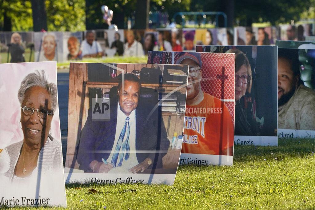 Carlos Osorio FILE - In this Aug. 31, 2020, file photo, some of the nearly 900 large poster-sized photos of Detroit victims of COVID-19 are displayed on Belle Isle in Detroit. The U.S. death toll from the coronavirus topped 200,000 Tuesday, Sept. 22, a figure unimaginable eight months ago when the scourge first reached the world’s richest nation with its sparkling laboratories, top-flight scientists and towering stockpiles of medicines and emergency supplies. (AP Photo/Carlos Osorio, File)